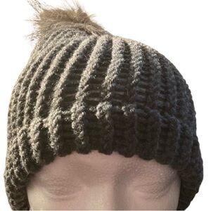 Handmade gray knit beanie hat with pom